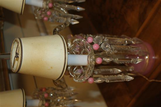 A pair of pink and white gilt decorated glass table lustres, total height 52cm